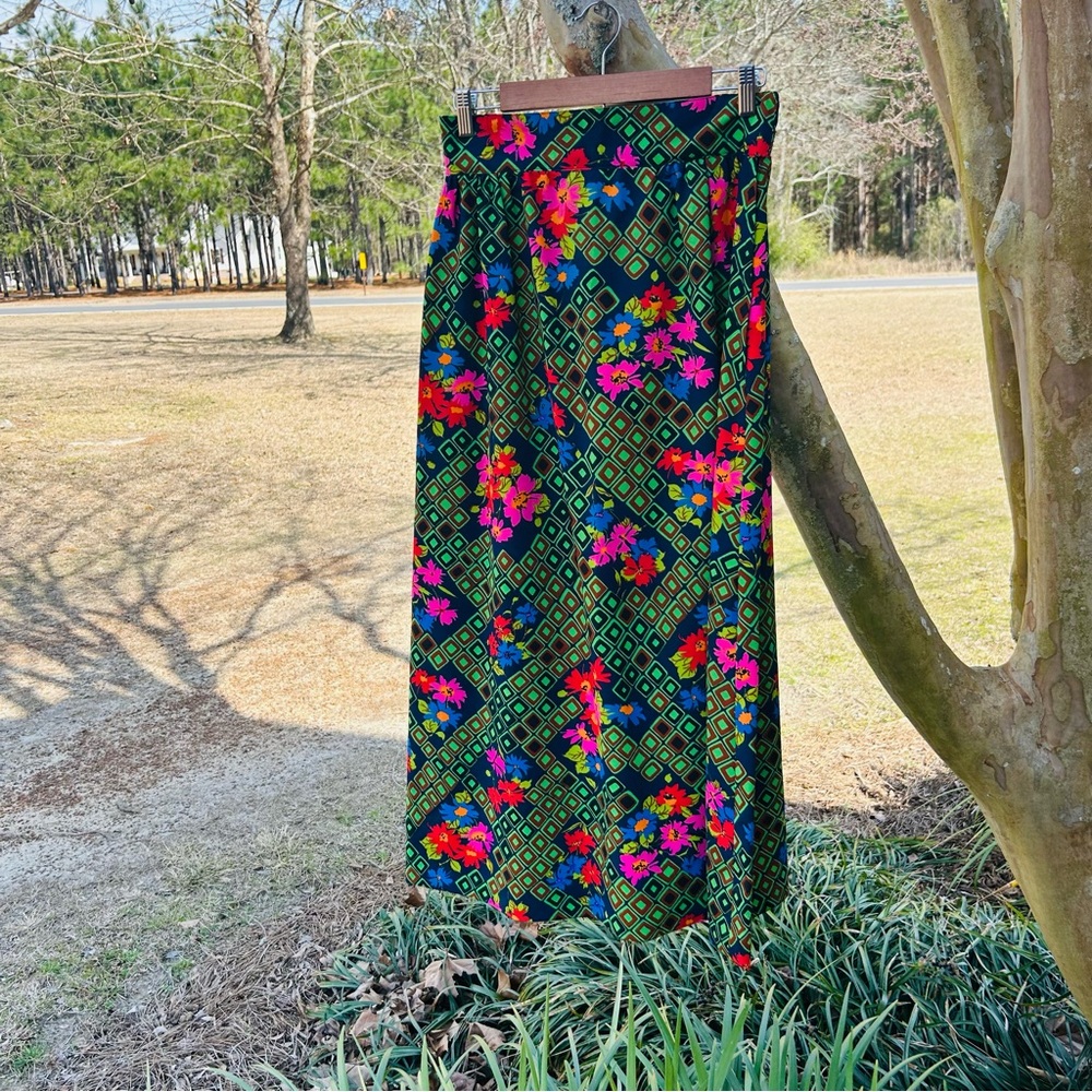 vintage-style women's maxi skirt with a floral pattern and geometric design 1970